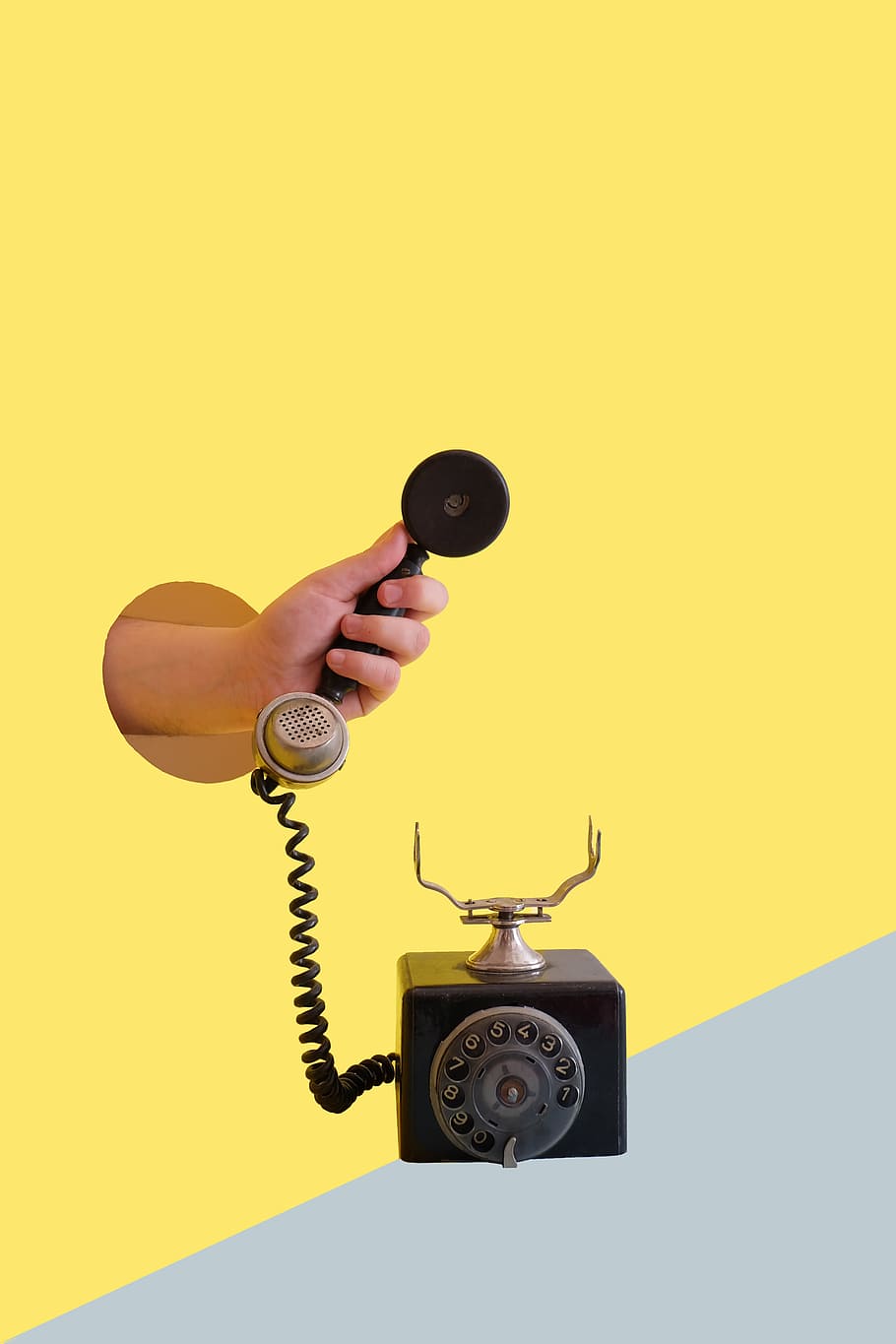 person holding black rotary telephone, hand, minimal, pop art