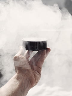 person holding black Amazon Echo Dot, cup, coffee cup, human HD wallpaper