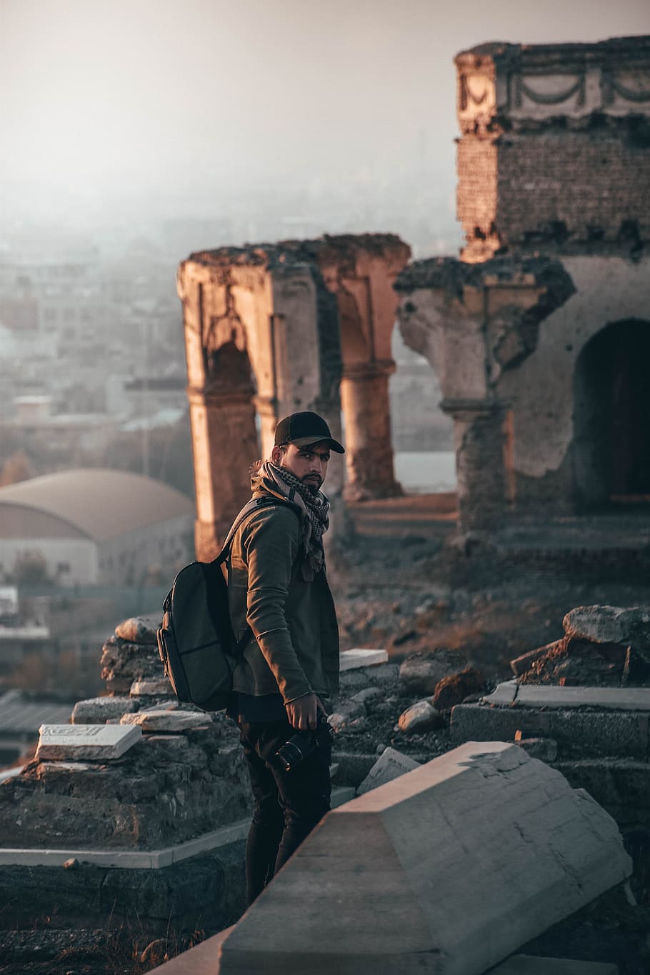 Man Wearing Cap and Backpack Standing on Ruins, abandoned, abandoned building, HD wallpaper