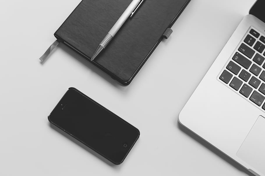 Black Iphone 5 Near Macbook Pro, blogging, copywriting, desk, HD wallpaper