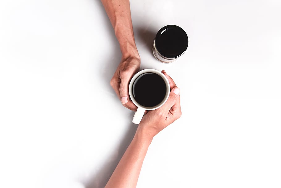 Two Person's Hand Holding White Mug Filled With Coffee, black coffee HD wallpaper