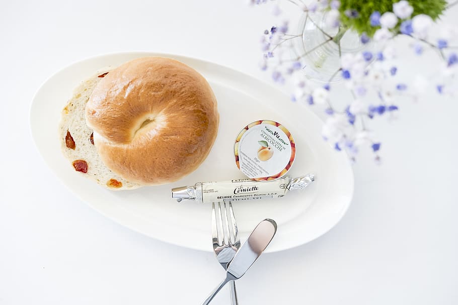 bread on white plate, food, bagel, fork, flower, knife, dish HD wallpaper